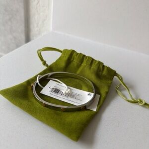 Tory Burch Silver Bangle Bracelet with Gold Accents